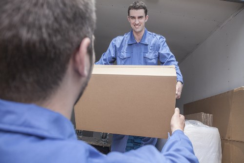 Moving boxes and furniture from a shared student house in Finchley