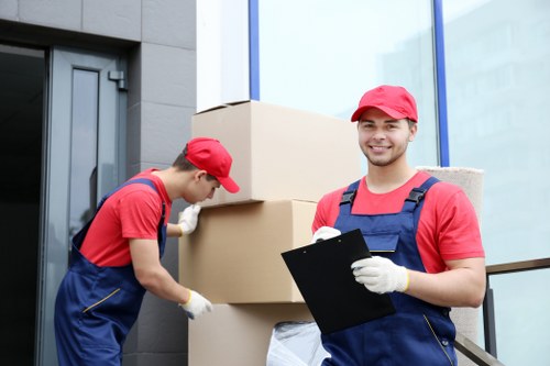 Moving team helping a Finchley home relocation on a residential street